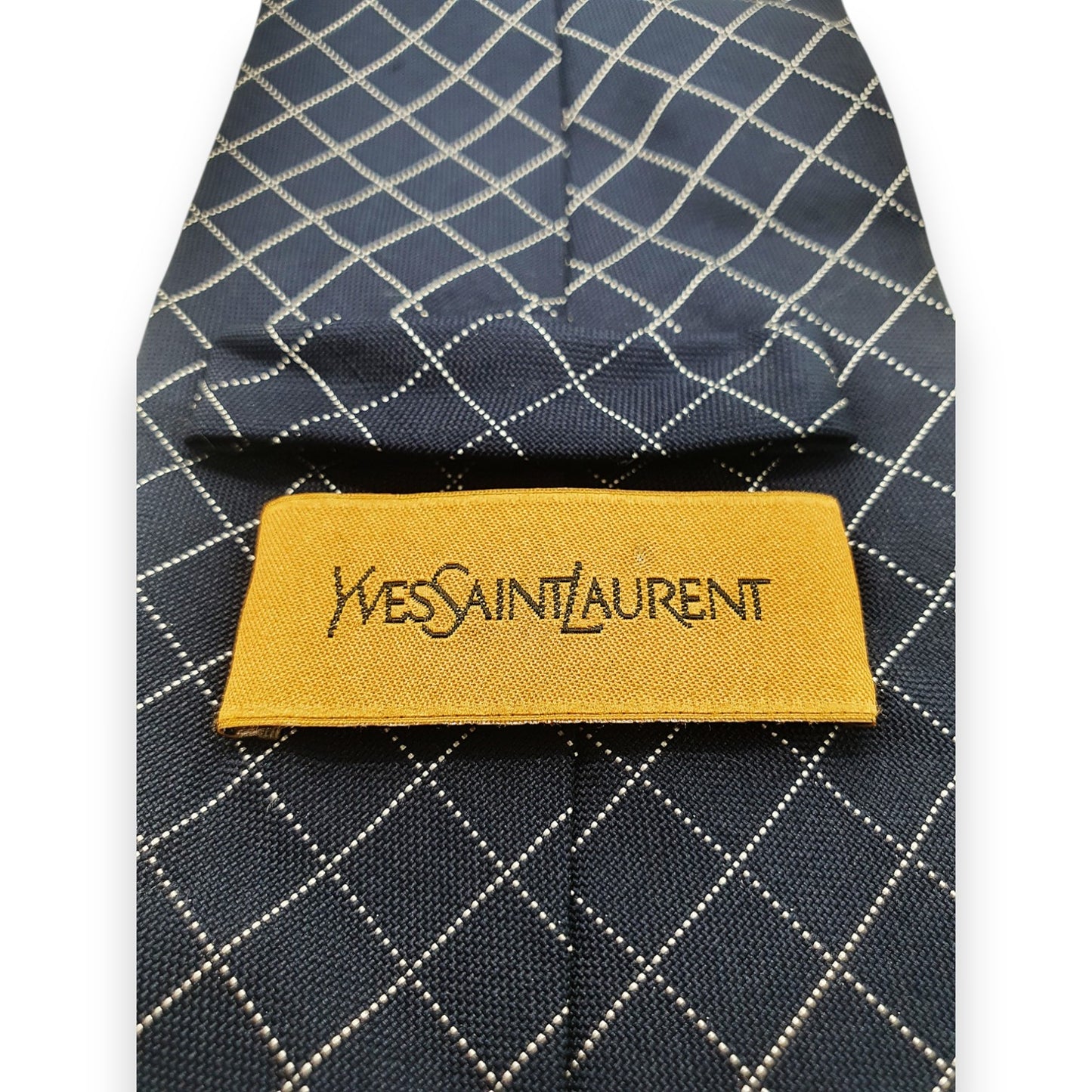Cravate Yves Saint Laurent bleu marine à lignes blanches