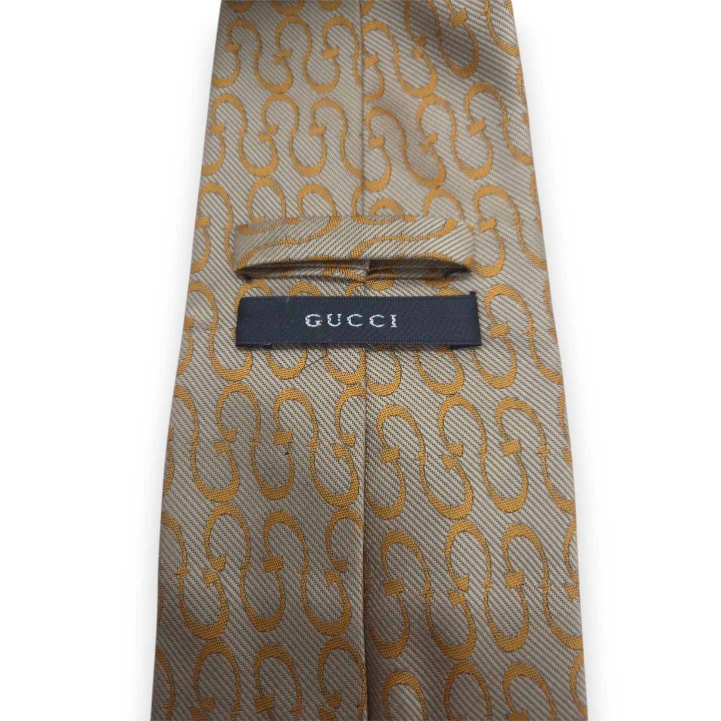 Cravate dorée Gucci