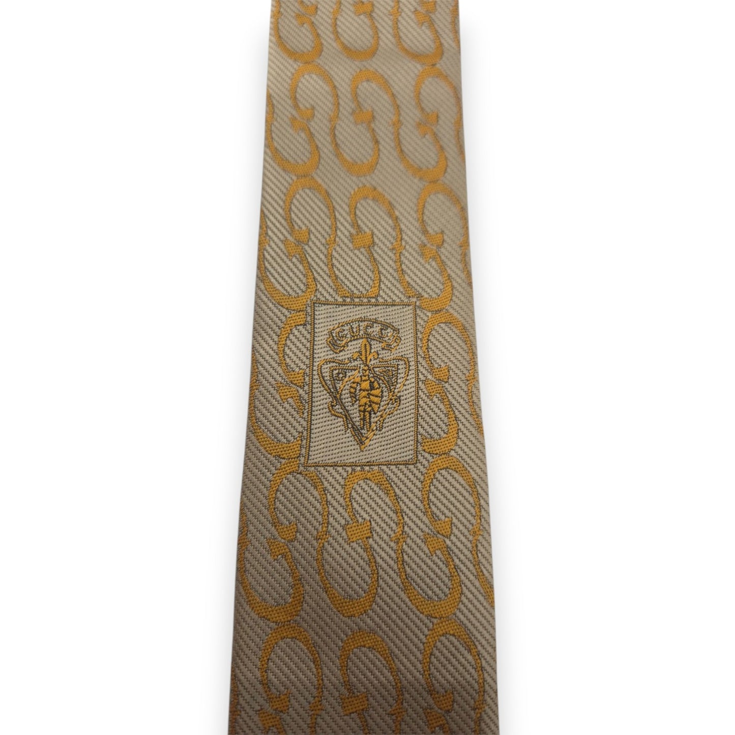 Cravate dorée Gucci