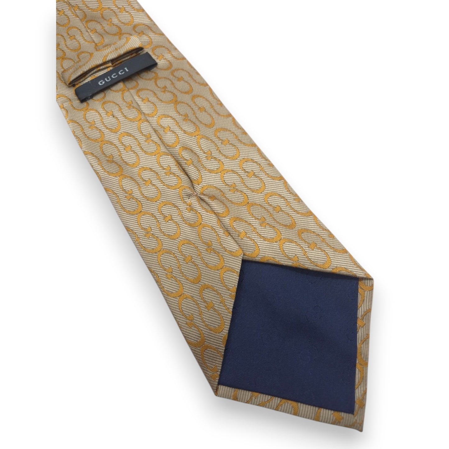 Cravate dorée Gucci