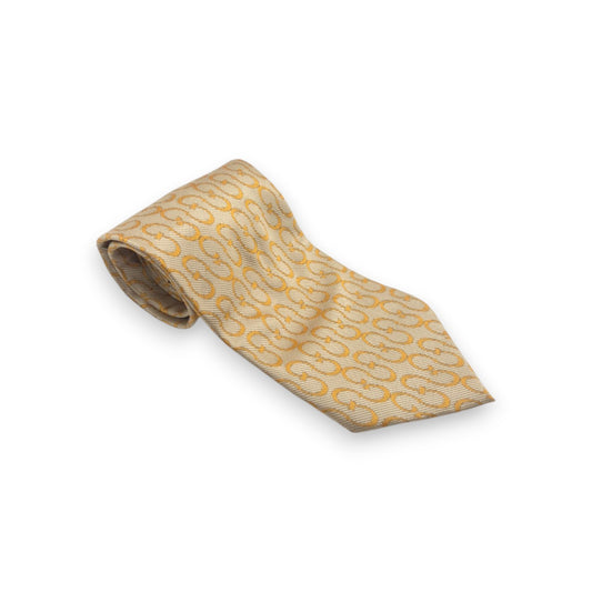 Cravate dorée Gucci