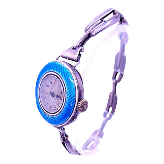 Montre femme ancienne guillochée en argent 925 et émail